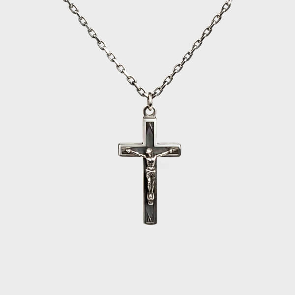 A bespoke crucifix necklace in silver.